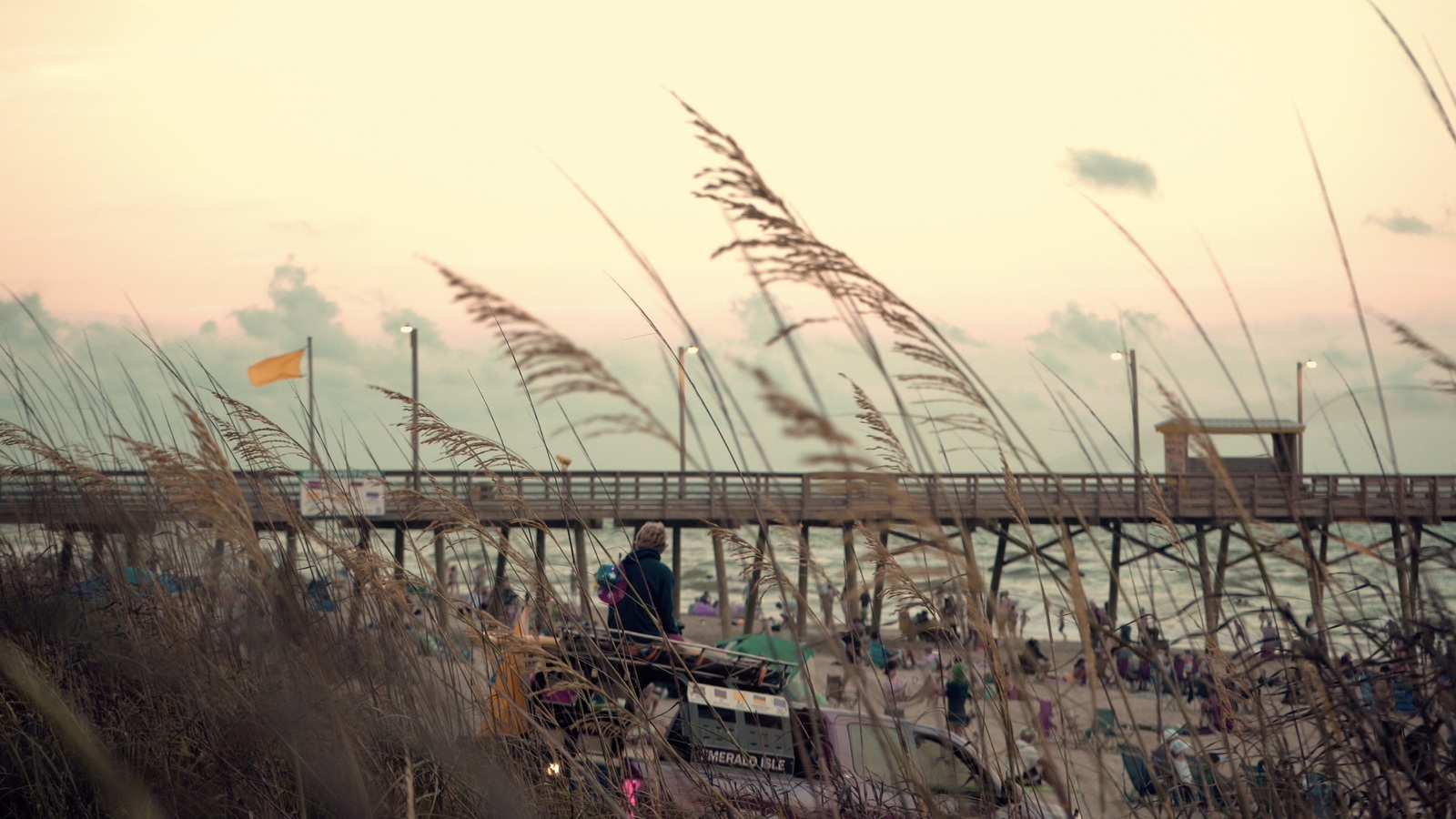 Emerald Isle beachfront and pier at sunset